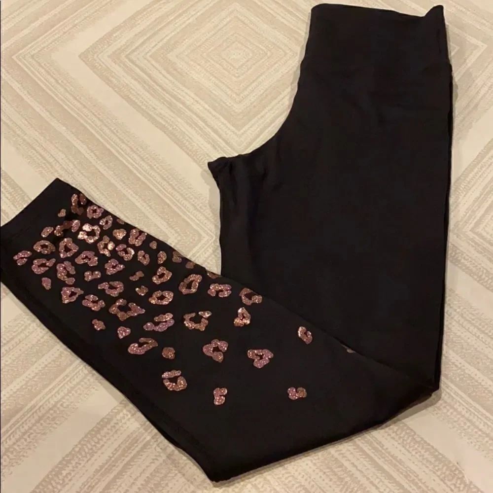 Beach Riot Black High Waisted Leggings with Rose Gold Glitter Cheetah on Leg